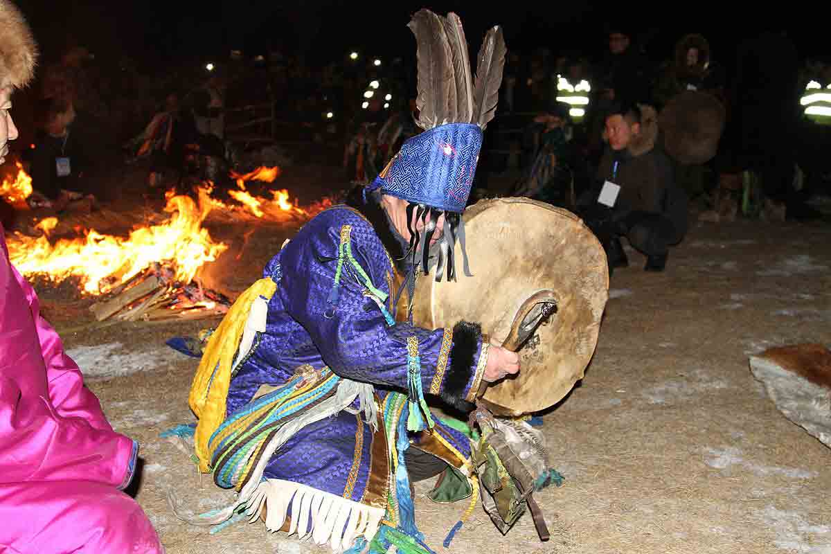 A Shaman performing a fire ritual at Lake Khövsgöl