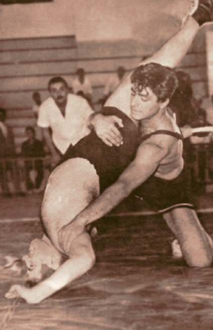 Men wrestling in the late 70's